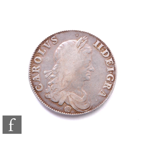 286 - Charles II (1660-1685) - A crown, 1662, first laureate draped bust of Charles facing right above ros... 