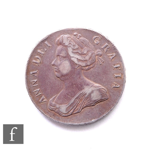 296 - Anne (1702-1714) - A crown, 1706, draped bust facing left, crowned cruciform shields, roses, plumes ... 