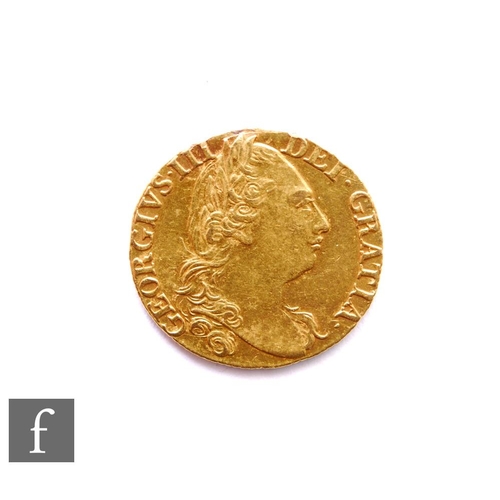 369 - George III (1760-1820) - A Guinea, 1781, fourth laureate head right, reverse crowned garnished shiel... 