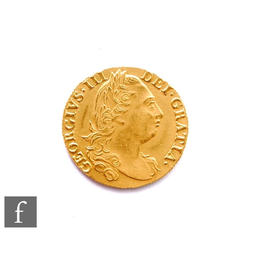 371 - George III (1760-1820) - A Guinea, 1777, fourth laureate head right, reverse crowned garnished shiel... 