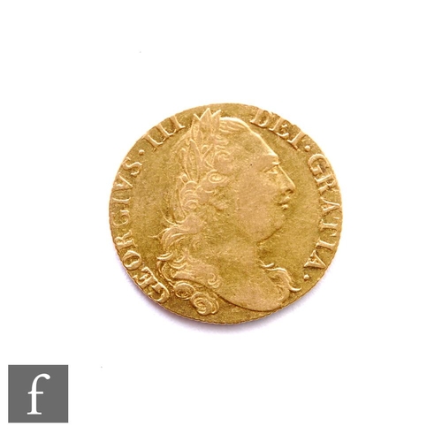 372 - George III (1760-1820) - A Guinea, 1777, fourth laureate head right, reverse crowned garnished shiel... 