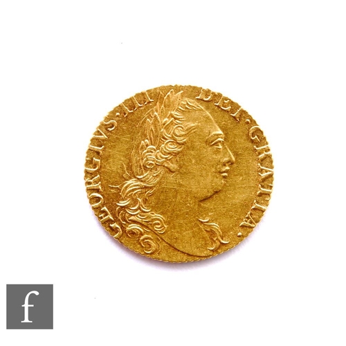 373 - George III (1760-1820) - A Guinea, 1774, fourth laureate head right, reverse crowned garnished shiel... 