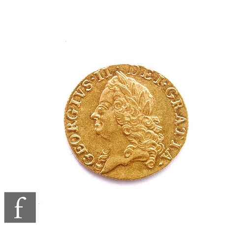 375 - George II (1727-1760) - A Guinea, 1760, old laureate head facing left, reverse crowned garnished shi... 