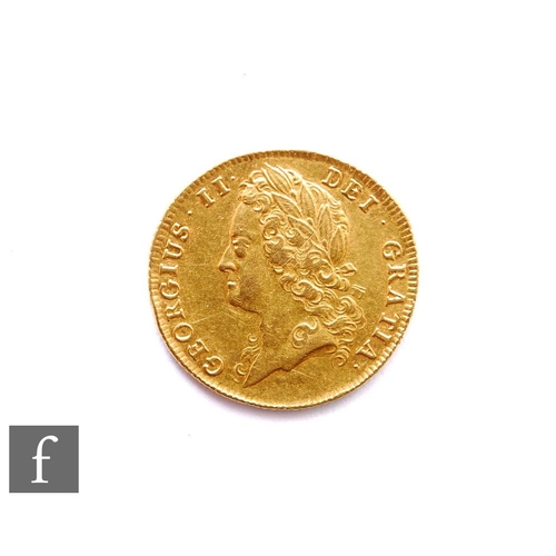 376 - George II (1727-1760) - A Guinea, 1739, fourth laureate head right, reverse crowned garnished shield... 