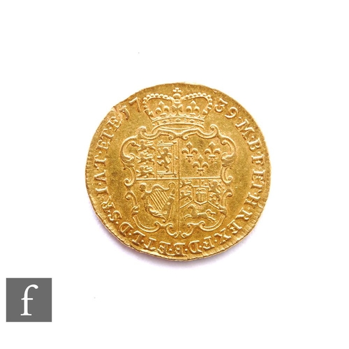 376 - George II (1727-1760) - A Guinea, 1739, fourth laureate head right, reverse crowned garnished shield... 