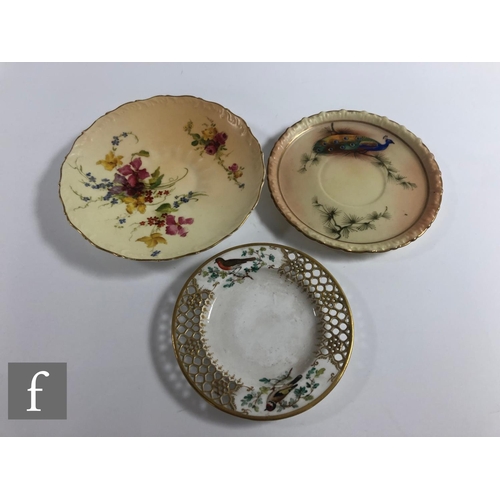 142 - A miniature Worcester reticulated cabinet cup and saucer, the double walled cup with reticulated out... 