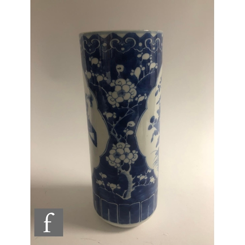 20 - A collection of Chinese late Qing Dynasty blue and white vases, to include a pair of sleeve vases an... 