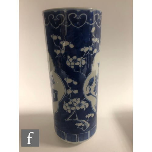 20 - A collection of Chinese late Qing Dynasty blue and white vases, to include a pair of sleeve vases an... 