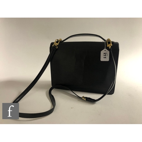 211 - A 1990s Louis Vuitton black Epi leather Monceau crossbody bag, with front pocket, embossed logo at f... 