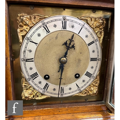 305 - A late 19th Century bracket clock with architectural style oak case, the brass dial with silvered ch... 