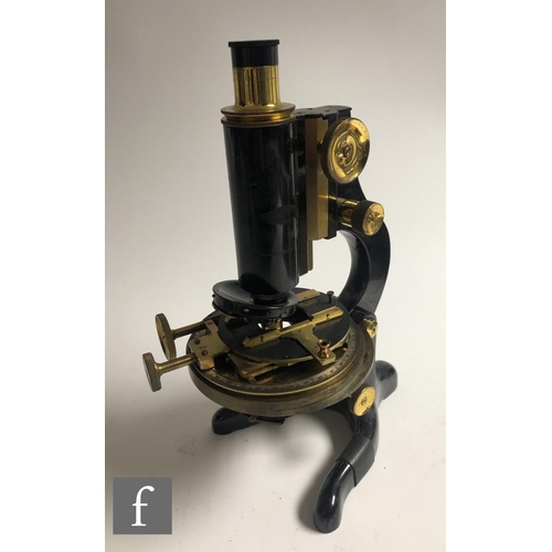 345 - An early 20th Century part brass and black painted microscope by W Watson & Sons London, No 7248... 