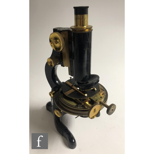 345 - An early 20th Century part brass and black painted microscope by W Watson & Sons London, No 7248... 