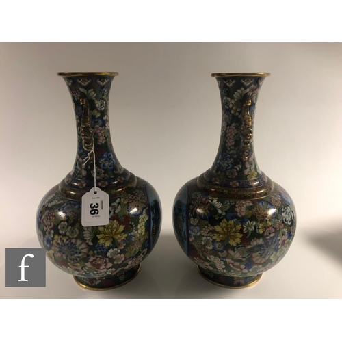 36 - A pair of Chinese cloisonne vases, each of bottle form, rising to a slender neck applied with cicada... 