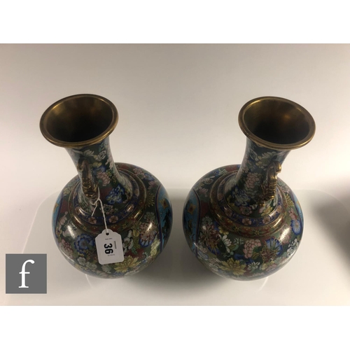 36 - A pair of Chinese cloisonne vases, each of bottle form, rising to a slender neck applied with cicada... 