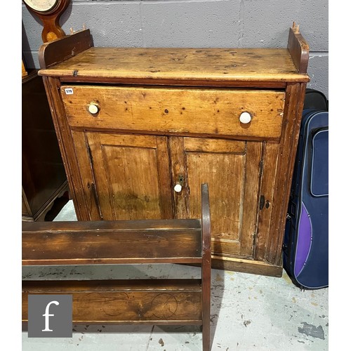 579 - A small Victorian stained pine dresser and rack, single drawer over a cupboard plinth base, height 1... 