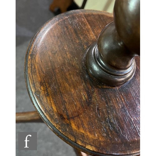 570 - A 19th Century circular rosewood lamp table or torchere stand, spiral twist column with small under-... 