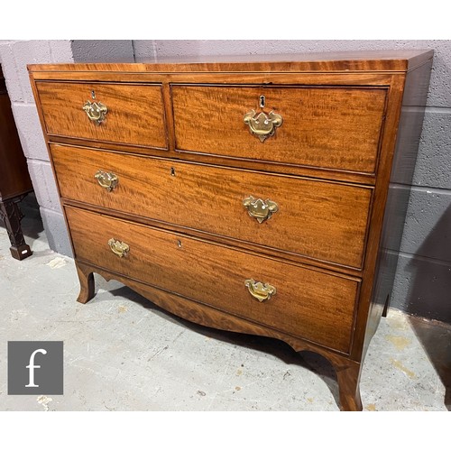 599 - A late 19th Century mahogany chest of two short and two long drawers, later brass fret handles, on s... 