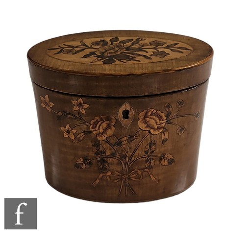 372 - An early 19th Century sycamore oval tea caddy with marquetry floral detail to both the front and the... 