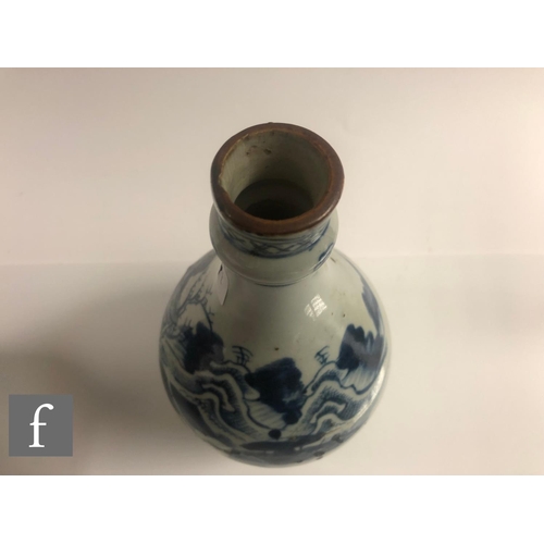 47 - Two Chinese blue and white vases, to include an 18th Century example of bottle form, height 23cm, to... 