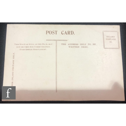 522 - An Edwardian woven silk postcard of the R.M.S Titanic within impressed floral border.NB - These card... 