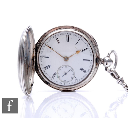 221 - A hallmarked silver full hunter key wind pocket watch, Roman numerals to a white enamelled dial, Lon... 