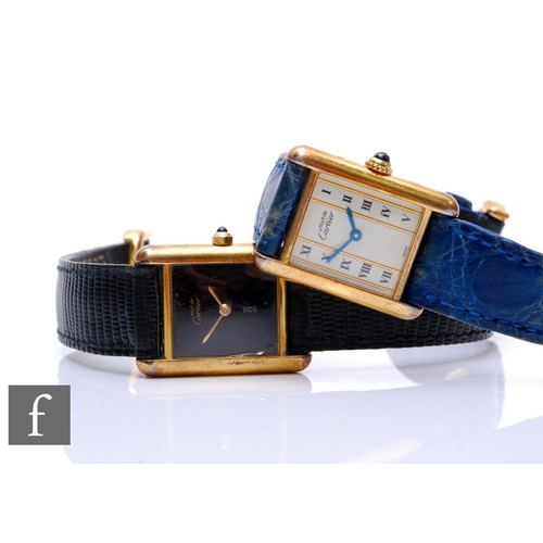 227 - Two lady's Cartier De Must silver gilt Vermeil wrist watches, ref No 5057001 and 366001, each to a l... 