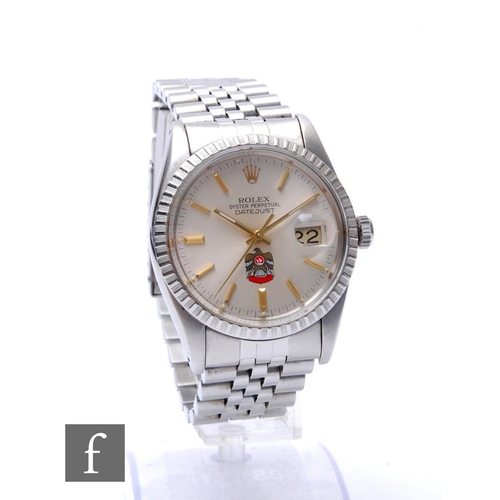 A gentleman's stainless steel Rolex Oyster Perpetual Datejust, gilt baton and date facility to a circular silvered dial with UAE crest above six o'clock, case diameter 36mm, to a conforming Rolex bracelet, with box (damages) and tag, no papers.