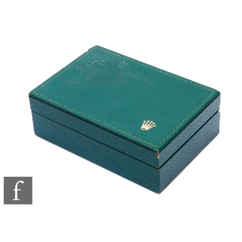 237 - A Rolex box in green leather with two watch boards inside, length 14.5cm, damaged.