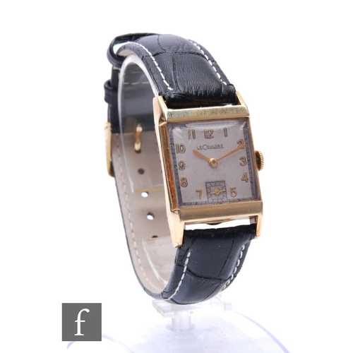 238 - A gold plated Le Coultre manual wind wrist watch, Arabic numerals to a silvered square dial, case wi... 