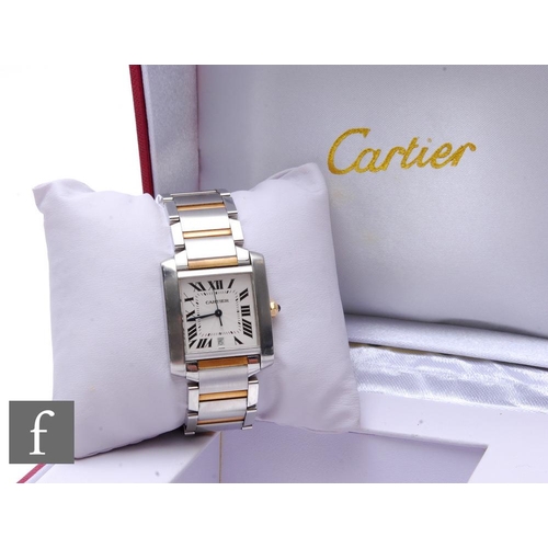 242 - A stainless steel Cartier Tank Francaise wrist watch, Roman numerals to a square white dial, case di... 