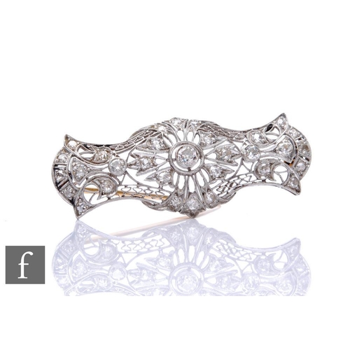 253 - An 18ct white gold diamond brooch filigree shaped rectangular body highlighted with old cut diamonds... 