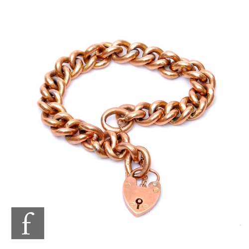 256 - A 9ct rose gold open curb link bracelet, weight 17.5g, terminating in padlock fastener, some damage.