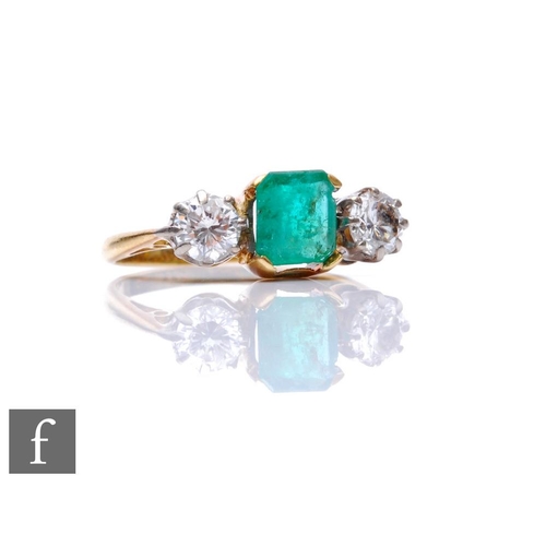 264 - An 18ct emerald and diamond three stone ring, square cut claw set emerald flanked by a 0.40ct diamon... 