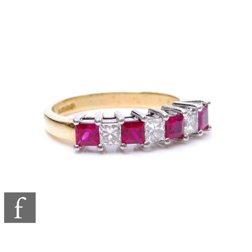 284 - An 18ct hallmarked ruby and diamond half eternity ring comprising seven alternating square cut rubie... 