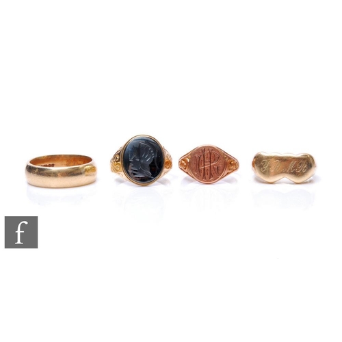 311 - Four 9ct hallmarked rings, two signet, a wedding ring and a further example, total weight 27.5g, var... 