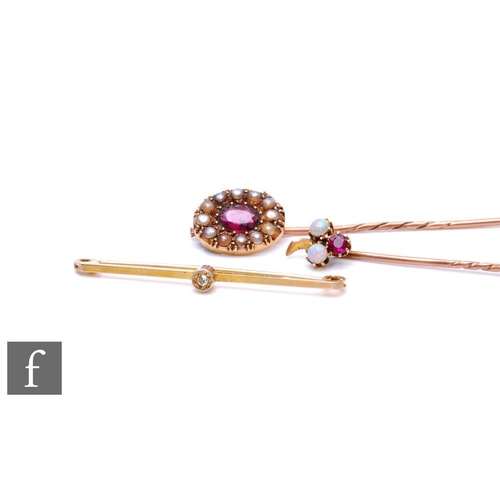 317 - Two 9ct stone set stick pins to include a ruby and opal three stone example, with a 9ct stone set ba... 