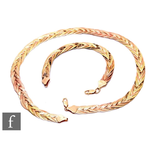 319 - A 9ct flat woven two coloured gold necklet and matching bracelet, total weight 30.5g, each terminati... 