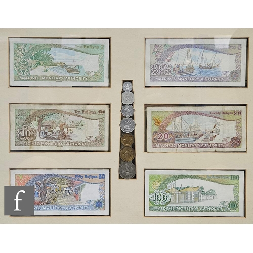 520 - A framed group of three Chinese 10, 20 and 50 custom gold unit bank notes, a similar framed group of... 