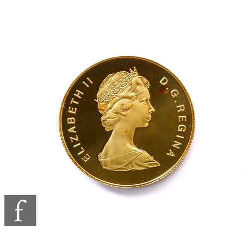 605 - A Canadian 1979 gold one hundred dollar coin, face Elizabeth II, reverse six children holding hands ... 