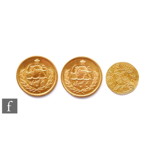 636 - Two Iranian Pahlavi gold coins, circa 1969, lion with scimitar to reverse, and small Mamud II Turkis... 