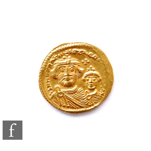 639 - A Roman Byzantine gold coin, Constantinople mint, Eastern Empire Solidus, reverse reads Victoria Vas... 