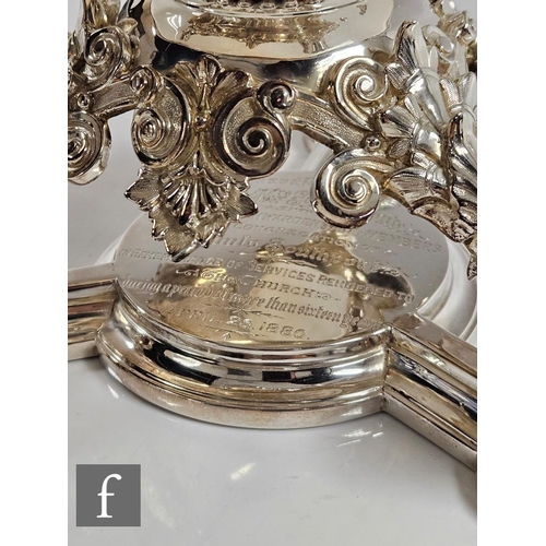 64 - A Victorian hallmarked silver table centre piece, triform base with presentation engraving below thr... 