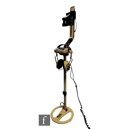 654 - A Minelab Explorer metal detector with Dragon LD 1701 headphones, no battery pack.