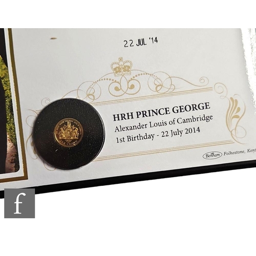 660 - An Elizabeth II 2014 one gold crown issued to commemorate HRH Prince George, mounted on first day co... 