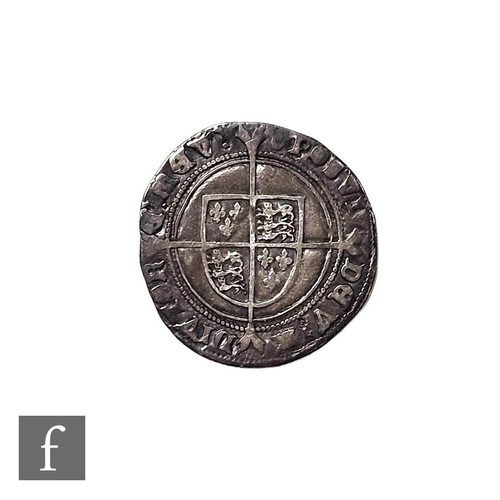 689 - An Edward VI (1547-1553) shilling, facing bust and rose, mm tun, 5.9g, S2482.