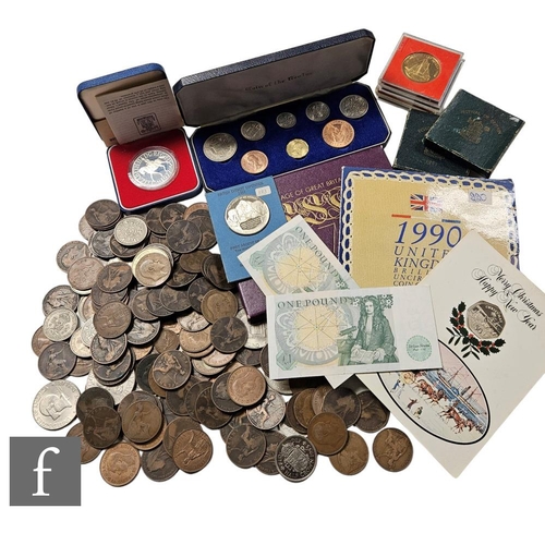 699 - A set of eight Elizabeth II 1966 issues, a 1977 silver Jubilee crown, a medallion to commemorate twe... 