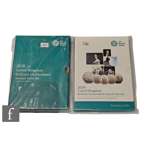 723 - Two Elizabeth II Royal Mint Annual coin sets, 2018 and 2019, boxed and sealed. (2)