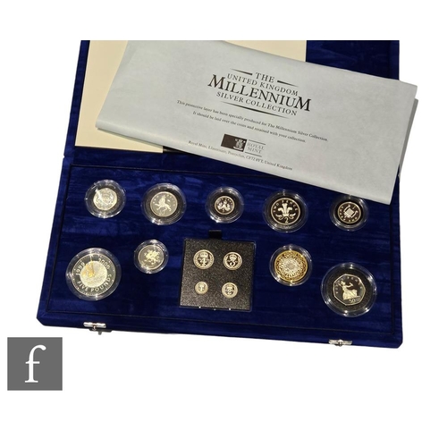 727 - An Elizabeth II Royal Mint thirteen coin silver collection in blue plush case with certificate No 10... 