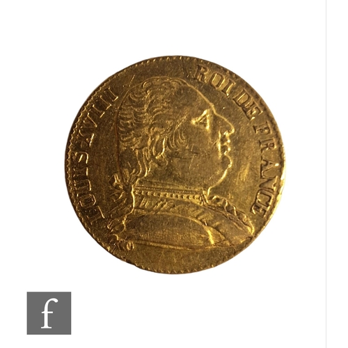 809 - A Louis XVIII 1815 twenty Franc gold coin, reverse crown over shield, three fleur de lys to centre, ... 