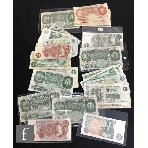 602 - A Bank of England 1951 five pound note, V20 067401, ten pound notes, a large collection of Britannia... 